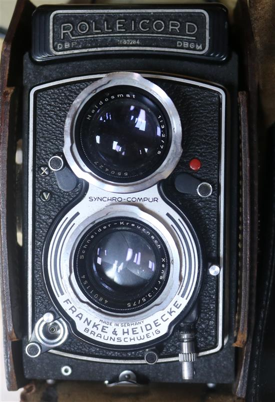 A cased Rolleicord camera